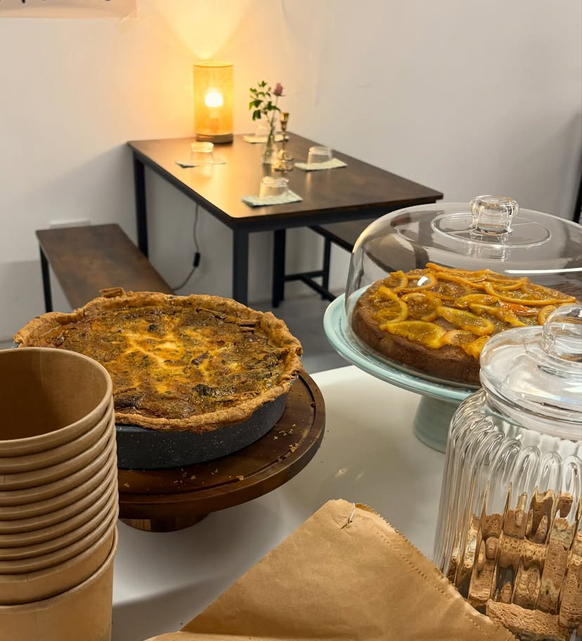 Quiche and citrus cake on a styled table