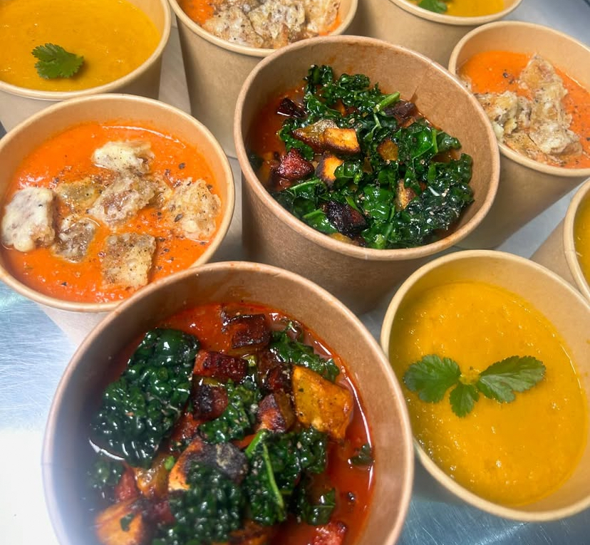 Seasonal soups topped with kale and croutons